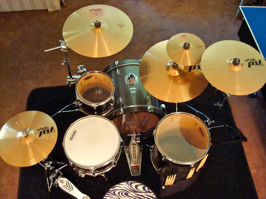 do you mount your toms to the right of your snare or one left and one right?